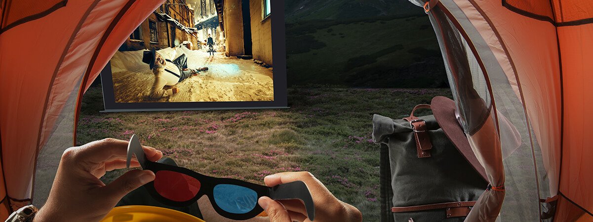 watch movies under the star in a tent with a portable projector